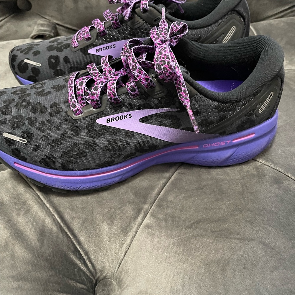 Brooks size 7.5 retired. Never worn. Cute leopard print